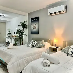 https://downtown-suites.quintano-roohotels.com